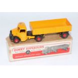 A Dinky Toys No. 521 Bedford articulated lorry comprising black and yellow body with red hubs,