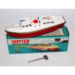 A Sutcliffe Models tinplate and clockwork model of a Jupiter Ocean Pilot Cruiser comprising of