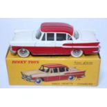 A French Dinky Toys No. 24K Simca Vedette Chambord comprising of red and white two tone body with