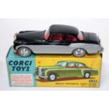 A Corgi Toys No. 224 Bentley Continental Sports saloon comprising of black and grey body with red