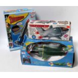 A collection of Thunderbirds and Thundercop related playsets and radio controlled models to