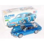 A Tamiya model No. 58168 1/10 scale kit built model of a radio controlled Alpine A110 race car,