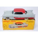 A French Dinky Toys No. 24D Plymouth Belvedere comprising of grey and red body with red roof, spun