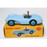 A Dinky Toys No. 104 Aston Martin DB3S comprising of light blue body with mid blue hubs and dark