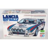 A Tamiya model No. 58278 1/10 scale boxed model of a Lancia 037 Rally car, suitable for radio