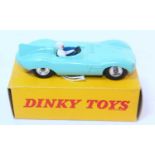 A Dinky Toys No. 238 Jaguar D-type racing car comprising of turquoise body with blue interior, white