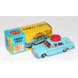 A Corgi Toys No. 236 Motor School Car comprising of light blue body with working steering mechanism,