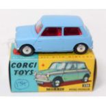 A Corgi Toys No. 226 Morris Mini Minor comprising of light blue body with red interior and spun hubs