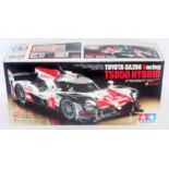 A Tamiya model No. 58665 1/10 scale radio controlled assembly kit for a Toyota Gazoo Racing TS050