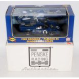 A GMP model No. 12003 1/18 scale model of a 1969 Donohue/Parsons Sunoco Lola Coupe, finished in