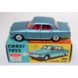 A Corgi Toys No. 252 Rover 2000 saloon comprising of metallic steel blue body with red interior