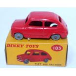 A Dinky Toys No. 183 Fiat 600 saloon comprising of red body with grey plastic wheels housed in the