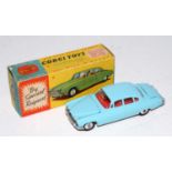 A Corgi Toys No. 238 Jaguar Mk X comprising of blue body with red interior and luggage load,