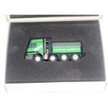 A Conrad model No. 40002 1/50 scale model of a Mercedes Benz Actross SLT tractor unit, comprising of