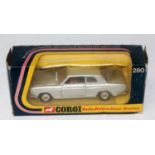 A Corgi Toys No. 280 Rolls Royce Silver Shadow comprising of silver body with brown interior and