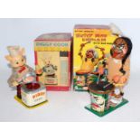 A tinplate and battery operated Japanese toy group to include a Marks Toys Nutty Mad Indian with War