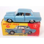 A Dinky Toys No. 139 Ford Console Cortina comprising metallic blue body with green interior and spun