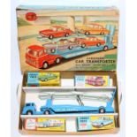 A Corgi Toys gift set 26 Carrimore Car Transporter with four boxed cars comprising of blue car