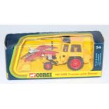 A Corgi Toys No. 54 MF50B tractor with shovel comprising yellow body with red plastic hubs and