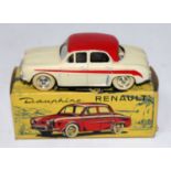 A CIJ of France Ref. No. 3/56 Renault Dauphine comprising of cream and red body with red side