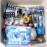 Two boxes containing a quantity of mixed boxed and loose Dr Who action figures, radio controlled