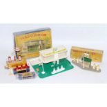 A collection of various boxed plastic and diecast roadside accessories to include a Matchbox BP