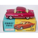 A Corgi Toys No. 316 NSU sport Prinz comprising of metallic pink body with silver detailing and