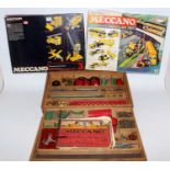 1950s Meccano collection in a home made wooden box, with two sets No. 3 circa 1970, appears unused