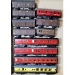 Two trays of much modified and repainted Hornby Dublo super detail coaches, and SD6 wagons, some