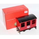 A Mamod maroon railway carriage only in original box appears unused