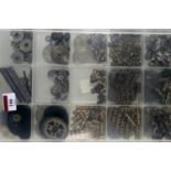 Compartmentalised and lidded plastic tray containing a large collection of 'Meccano' brass items: