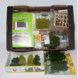 Box and tray with a quantity of made, part made and unmade card and plastic buildings and scenic