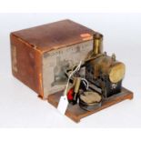 A Mersey Model Co small spirit fired steam engine with burner and instructions in original box,
