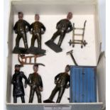 Six Britains railway staff cast figures includes station master, 5 porters, 2 barrows and luggage