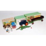 A collection of Britains boxed farming implements and loose farm accessories, to include a No.