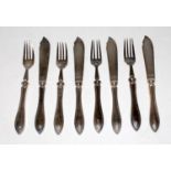 Four fish knives and 4 fish forks by Hutton of Sheffield, all LNER script pattern and well used