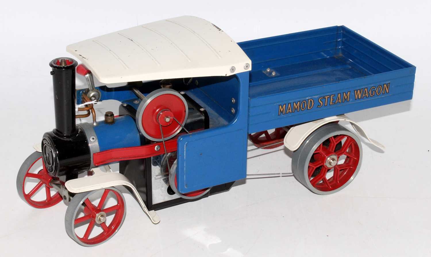 Mamod steam wagon, blue/white with red spoked wheels, some chips to roof and floor (G)