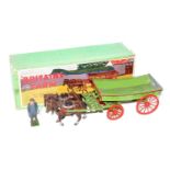 A Britains Home Farm Series No. 5F farm wagon, comprising green body with two horses and farm hand