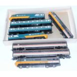 2 Hornby 4 car HST trains, one in BR blue/grey livery (G) and the other in Intercity grey livery (