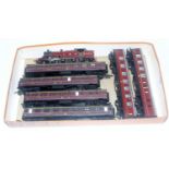 Tray containing Hornby LMS red 2-6-4 tank engine (G) together with 2 LMS coaches and 4 Airfix LMS