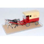 A Charbens 1950s repainted model of a lead horsedrawn Hovis Bread delivery cart comprising of red