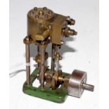 A home made cast iron steel and gunmetal model of a single cylinder vertical steam engine raised