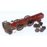 A 2" gauge assembled frame, cylinders and wheels for a 2-4-2 locomotive also set of six tender