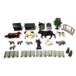 A collection of various Britains and other lead hollow cast farm items to include various animals,