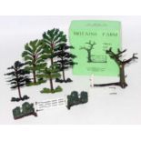 A collection of Britains lead and hollow cast farm series accessories to include a boxed No. 7F tree