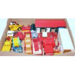 One tray containing a quantity of various Britains farm vehicles and accessories to include a Massey