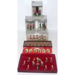 A collection of various boxed and plastic cased Britains modern release figure sets to include the