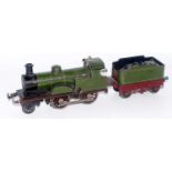 A Bing Works gauge 1 2-4-0 engine and tender clockwork, finished lined green as no. 2663 tender