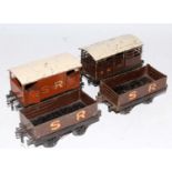 Four x 1928-30 Hornby SR wagons on o.a.g bases including cattle truck - poor roof, 2 x open wagons
