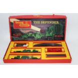 A Triang RS50 'The Defender' train set containing BR green 0-6-0 diesel shunter, NATO green